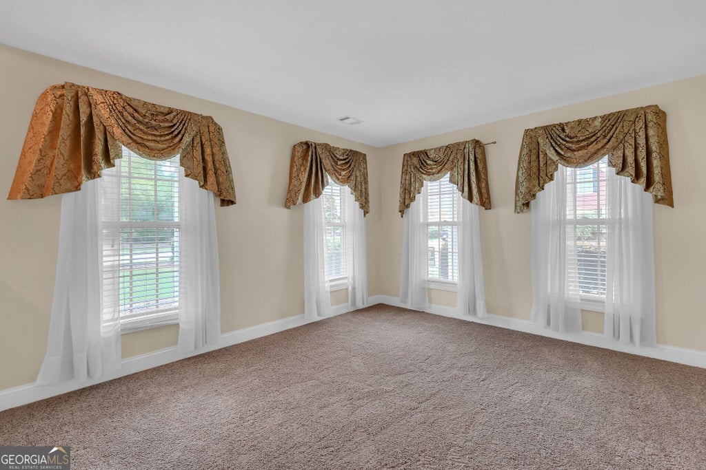 Photo of 2055 Hickory Station Circle, Snellville, GA 30078 (MLS # 10870960)