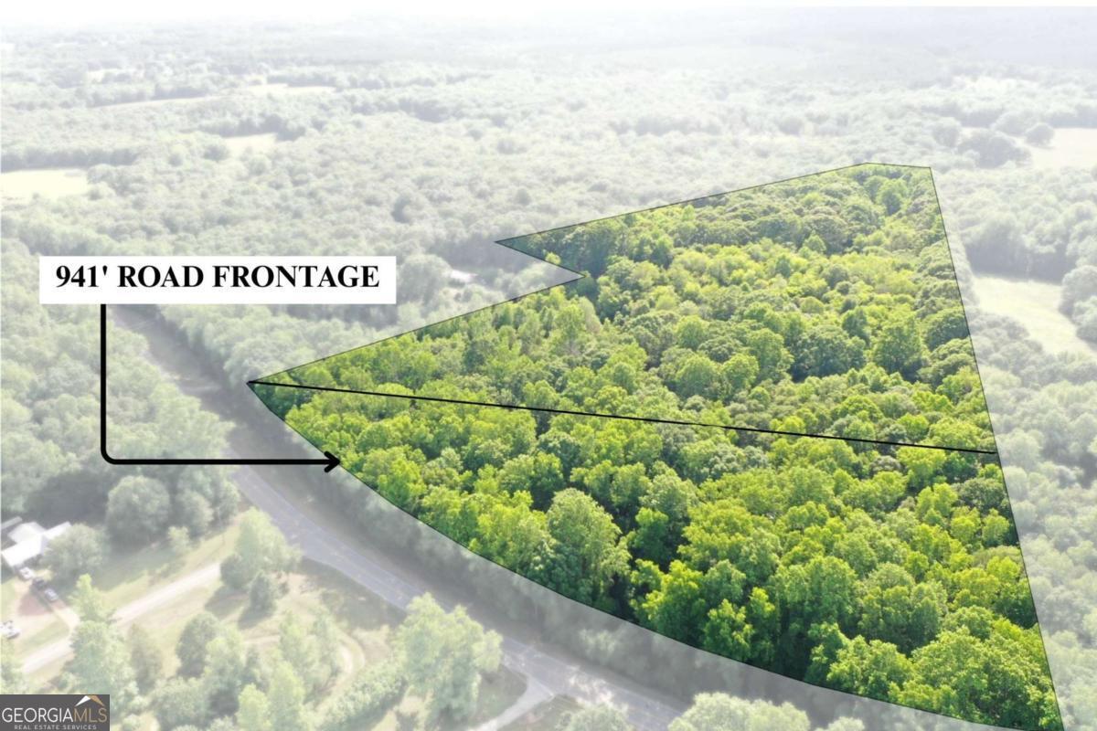"2 Parcels being sold as 1 in booming Madison County! Spanning over 22 acres in total, and 941 of road frontage, perfect for any future developments, customized home, or even recreational use. There is also a vacant barn and mobile home on the property. Conveniently located less than 10 minutes from downtown Danielsville and 30 minutes from Franklin Springs and Emmanuel College! Come see before its too late!" Water and power are available.