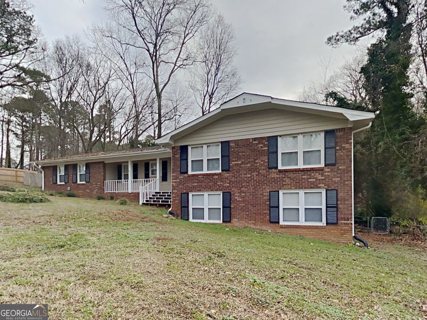 Beautiful ranch home in Holly Springs North! Rocking chair front porch! Spacious living room with access to backyard! Sparate dining room! Kitchen features white cabinets, stone counters, SS and black appliances, and breakfast area! Bonus garage conversion allows for additional family room, playroom, or rec space! Spacious primary bedroom includes private bathroom! Two spacious secondary bedrooms share another full bathroom! Unfinished basement! Rear deck/patio overlooks fenced backyard! A must see! Submit your offer today!