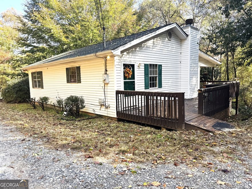 Discover a fantastic investment opportunity at 1107 Orchard Road in the heart of Ellijay! This unique property features TWO dwellings on a single lot, perfect for rental income, multi-generational living, or a savvy investor looking to maximize returns. Property Highlights: Main House: A charming 2-bedroom, 1-bathroom home, offering cozy living spaces with classic appeal. Ideal for a small family or as a primary rental unit. Second Unit: A single wide 2-bedroom, 2-bathroom trailer, providing additional living quarters or a separate rental opportunity. The trailer needs some TLC but has its own septic system and electrical meter. This property is a rare find for investors or buyers seeking versatility in a prime location. Don't miss the chance to own this income-producing gem in Ellijay! More Pictures to come.