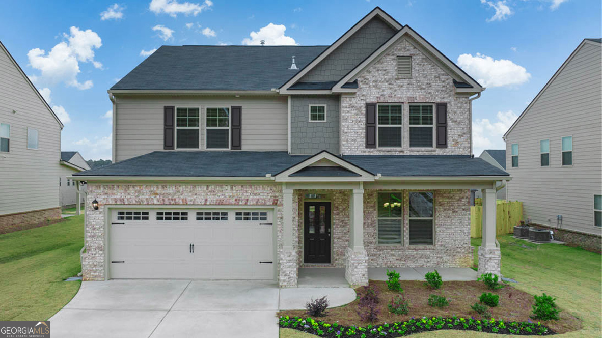 Located in the highly sought-after EAST COWETA SCHOOL DISTRICT and just minutes from downtown Senoia and Peachtree City shopping and dining, the Hampshire at Heritage Pointe is a 4 bedroom, 3 bathroom two-story home. A formal dining room greets you at entry perfect for family dinners and holiday gatherings. The gourmet kitchen features a large island with bar stool seating, contemporary cabinetry, quartz countertops, stainless steel appliances including a stainless steel vent hood to the ceiling, single wall oven, wall microwave, and gas cooktop, plus a spacious pantry and butler's pantry. The kitchen opens to a casual dining area and family room with a cozy fireplace. A guest bedroom with full bath completes the main floor. Upstairs, enjoy a versatile second family room, ideal for a media or game space. The private owner's suite includes a sitting area, oversized closet, and spa-like bath with dual vanities, separate shower, and garden tub. Two secondary bedrooms, a hall bath, and a convenient laundry room complete this thoughtful design. Additional features include a 2-car garage, energy-efficient construction, and D.R. Horton's industry-leading smart home package. Photos are for illustrative purposes only and may not depict the actual home.