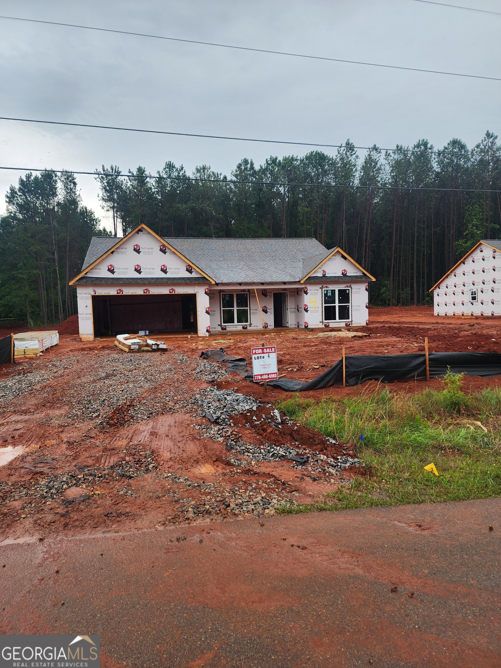 NEW CONSTRUCTION on large, wooded lots! Covered Back Porch! The Dogwood Floorplan has 4BR/2.5 BA and is an Open Concept with Wood-Burning Fireplace in the Family room. Granite countertops. Huge Island in kitchen with custom cabinets. Separate Dining room/Flex room. Spacious Master Suite w/ Soaking Tub, Separate Shower & Double Vanity! LVP flooring throughout. Easy access to Hwy 78 and Hwy 316 for commuters. $4K Seller paid Closing Cost with Preferred Lenders. Photos and/or renderings are representative and not the actual property. Come choose your colors!! Completion October 2025