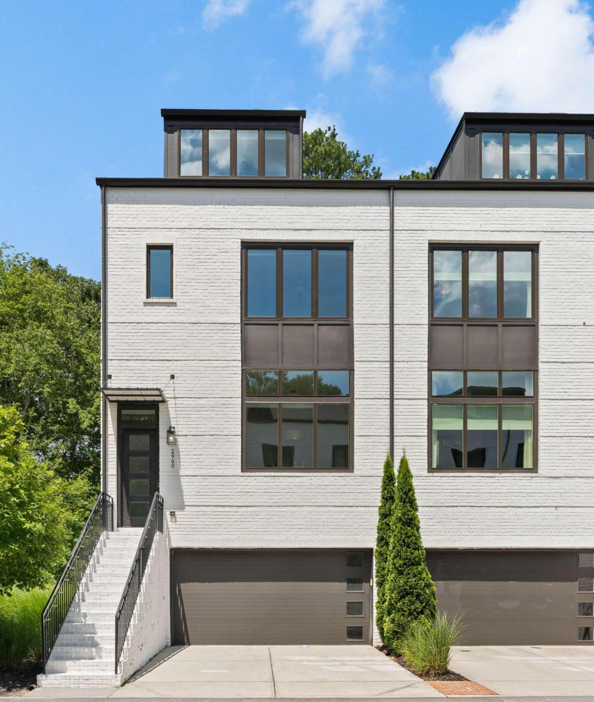Lock-and-leave or move-in and stay, you will find the finest upgrades, the most delectable design decisions and an extremely enjoyable layout at this special end unit in Brookhaven Wilshire. This home was built in 2017, it still looks and feels brand new and it is elevator-ready. The main level centers around its gourmet kitchen, featuring a large island with the most gorgeous Brazilian quartzite countertop. The perimeter countertops, as well as secondary bathroom countertops, are Cambria quartz. This unit's elite appliance package includes a Bertazzoni gas range and oven, Subzero refrigerator and freezer and Bosch dishwasher, and the kitchen includes a large walk-in pantry. The living room is adjacent and open to the kitchen and features a unique wooded view across the entire back wall of the home, through floor to ceiling glass sliding doors. The outdoor living area is covered and feels like a private oasis for enjoying nature or entertaining guests. The main floor also includes a separate dining room and powder room and has a built-in speaker system as well. This townhome includes four levels of living. Upstairs from the main floor is where the primary suite can be found, with a marvelous ensuite bathroom with soaking tub, separate shower, dual vanity with marble countertops and a spacious, walk-in closet. The secondary bedroom on the same level also includes an ensuite bathroom and walk-in closet. Laundry can be found on this floor as well. Going to the top floor of the unit, there is a large bonus space, great for a secondary living area, office, playroom or private living quarters. There is also a bedroom and full bathroom on this floor as well. Finally, the terrace level includes the garage, featuring pristine epoxied floors, a bedroom with full bathroom and an additional office or flex space. The home includes Bali blinds, many remote controlled. The quaint community of Brookhaven Wilshire is gated, has a community greenspace and includes 18 homes. Its proximity to retail, restaurants and easy access to other areas of Atlanta make this home feel like a retreat though with the many perks of the city nearby.