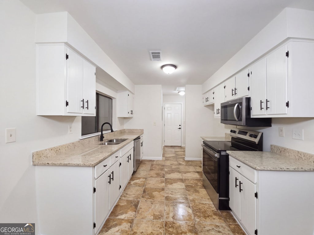 Photo of 3118 Caliente Lane, Rex, GA 30273 (MLS # 10853760)