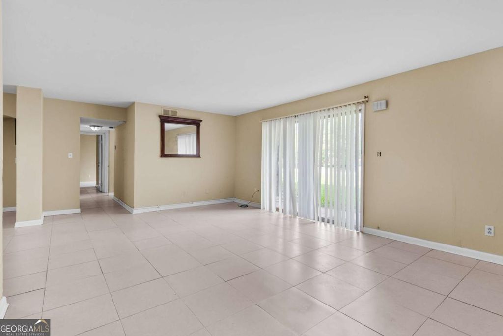 Photo of 115 Camelot Drive, Atlanta, GA 30349 (MLS # 10656298)