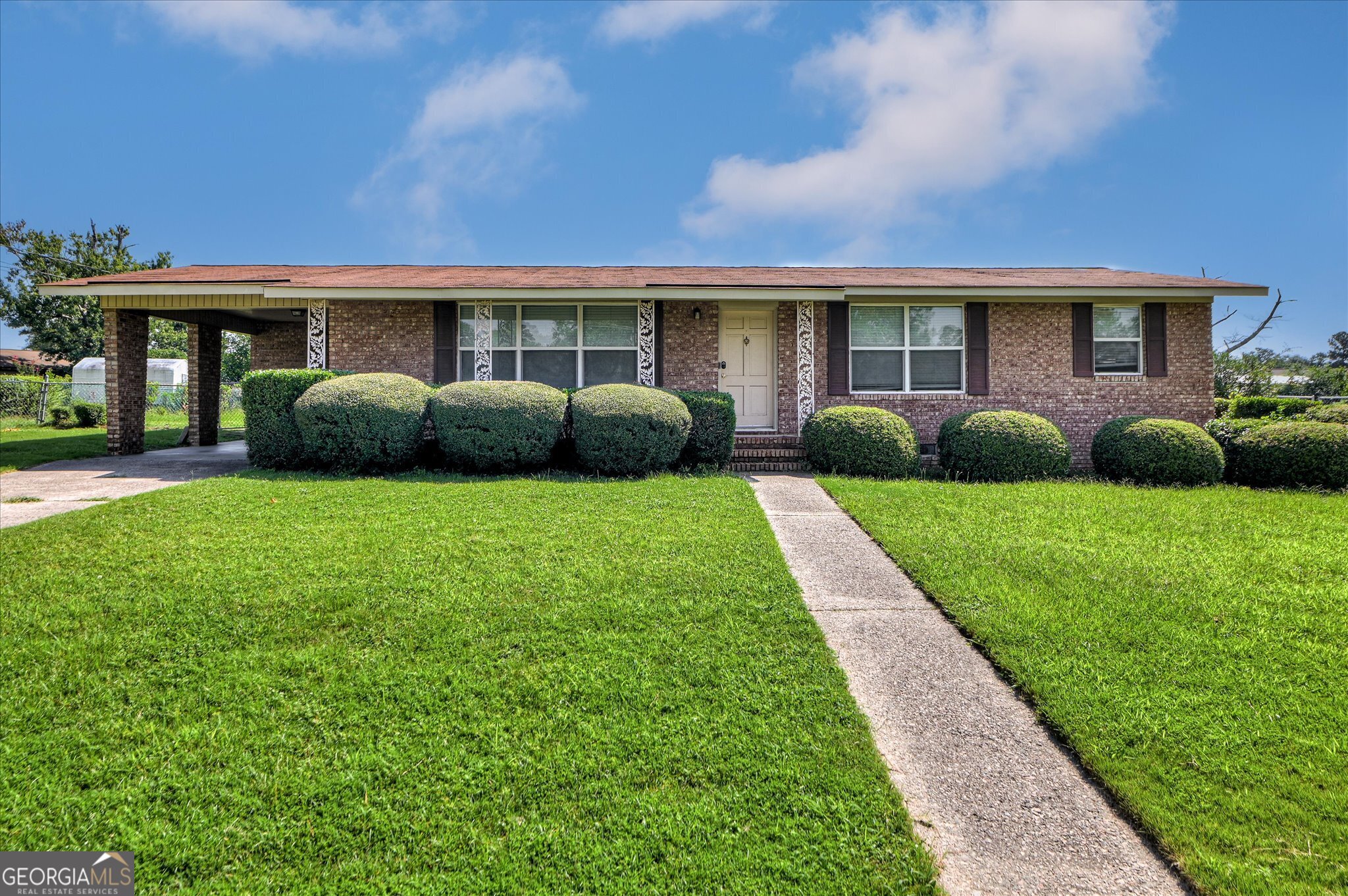 Beautiful brick ranch with new luxury vinyl flooring thruout and freshly painted interior. Living area, dining room and great rooom opens to kitchen. Large flat fenced backyard. Close to shopping and Fort Gordon