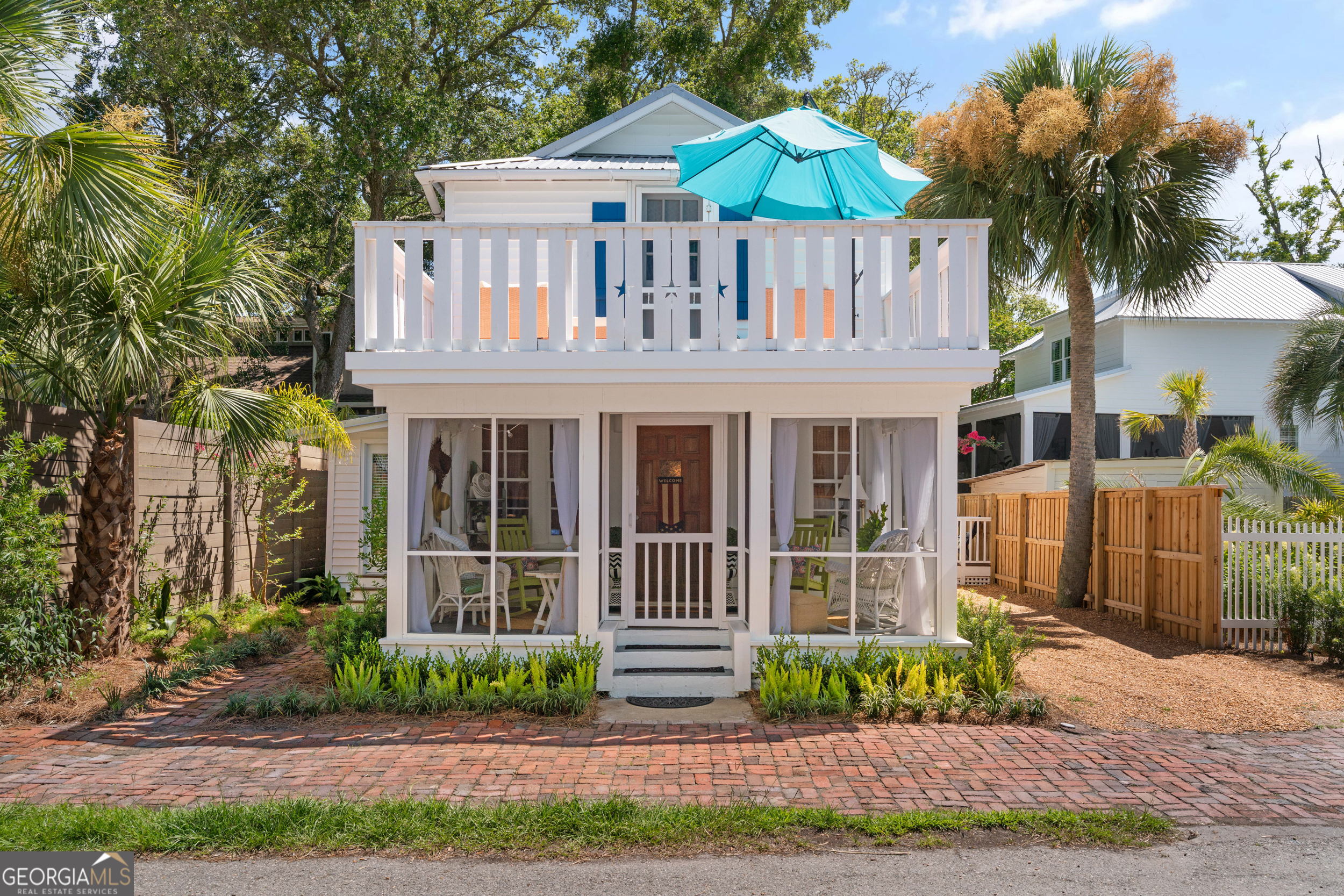 Charming Beachside Cottage - Turnkey & Income-Ready! Welcome to your coastal escape! Just steps from the ocean, this meticulously renovated and professionally decorated 3-bedroom, 2-bath original 1931 beach cottage offers the perfect blend of charm, comfort, and convenience. Every detail of this home has been thoughtfully curated, from its bright, airy interior to its high-end finishes and coastal-inspired decor. Offered fully furnished, this quaint property is truly turnkey-ideal as a personal retreat or a lucrative vacation rental. Enjoy morning coffee with ocean breezes on the upper deck, spend your days on the sand just moments from your door, and return to a serene, stylish space designed for relaxation. This beautiful beach home features original hardwood floors, newly renovated kitchen and baths, an outdoor shower, designer carpet in the upstairs bedrooms, new windows, new decking, new screen porch and so much more. Every surface has been upgraded, new paint, local artist crafted wall murals, appliances, tile, fixtures and lighting! Whether you're looking for a family getaway, an investment opportunity, or both, this gem by the sea is ready to deliver. Don't miss the chance to own a slice of paradise with strong rental potential and timeless coastal appeal.
