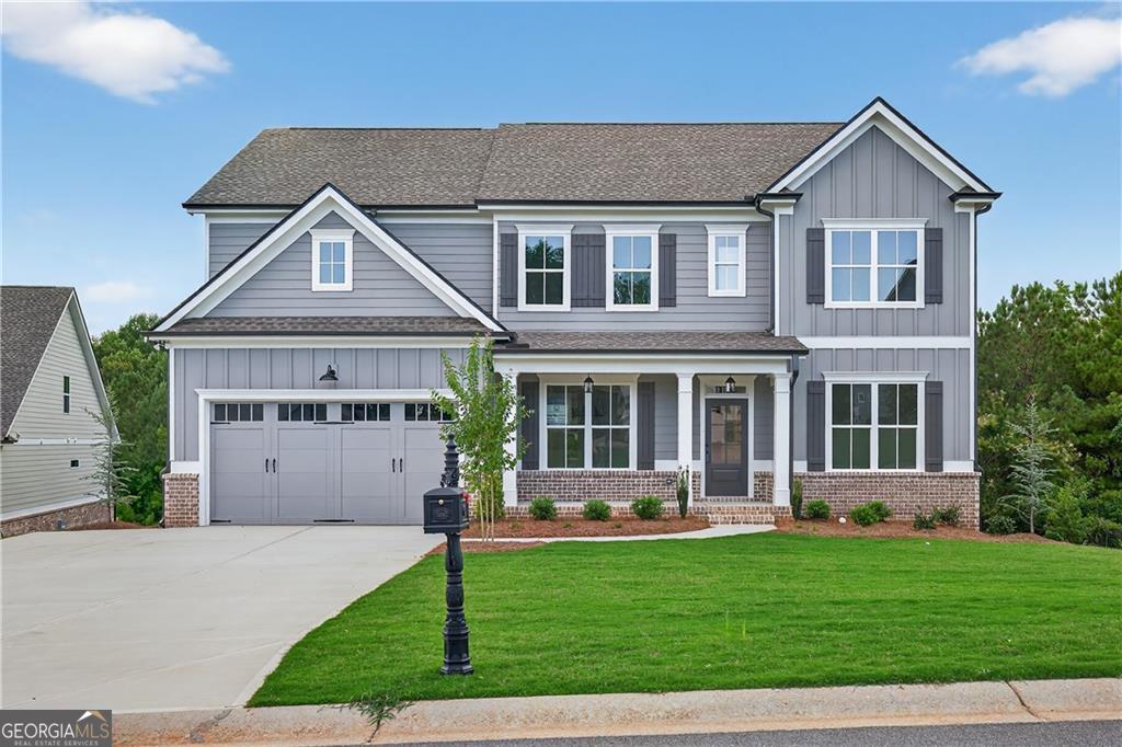 "LOT 159Q/JACKSON PLAN" Another impressive home in Traditions of Braselton by Hillgrove Homes! This floorplan boasts 5 bedrooms, 4 full baths and has all the designer touches. The spacious Gourmet Kitchen w/ oversized island overlooks the inviting Family Room. Coffered ceilings, shiplap, brick fireplace, cedar mantle and built-in cabinetry complete this space. The Kitchen features custom painted cabinetry w/ soft-close drawers, quartz or granite countertops, stainless steel appliances, tile backsplash, farm sink and spacious walk-in pantry. A Dining/Office/Flex Space and Study right off the Foyer boasts an extensive trim package. The oversized Primary Suite & Primary Bath add SO much space to this home and are complete with an oversized super shower and soaking tub, upgraded cabinetry and countertops, dual sinks and upgraded tile. Large secondary bedrooms (one full bed/bath on main level), closets & bathrooms are an extra perk. The covered back porch w/ fireplace is perfect for entertaining or back porch sitting! GOLF CART GARAGE! Sought-after Jackson County School System. Traditions of Braselton awards you swim/tennis/golf/restaurant/clubhouse/fitness facility and more. Endless activities for the amenity rich community seeker.