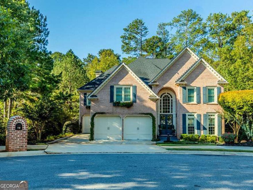 Welcome to this timeless 4-sided brick home, perfectly situated on a cul-de-sac lot with private access to The Big Creek Greenway. Just minutes from Avalon and downtown Alpharetta, this property offers both convenience and tranquility in a prime location. Step into your backyard paradise, complete with a waterfall edge pool, spa, and outdoor kitchenCoideal for hosting summer gatherings. A fireside chat area, rustic fire pit, and flat backyard provide multiple spaces to relax and entertain. Whether enjoying quiet evenings or lively get-togethers, this outdoor retreat is unmatched. The fully finished terrace level offers incredible versatility, featuring a second kitchen, theatre room, recreation room, full bedroom and bath, and abundant storage. Imagine the possibilities of linking outdoor and indoor entertaining spaces for guests of all ages. Enter through a welcoming foyer and discover a thoughtfully designed floor plan. The main level boasts: A bedroom and full bath, ideal for guests or a home office, Three distinct living areas offering ample space for relaxation, A large, separate dining room perfect for hosting formal dinners, A keeping room with a fireplace off the eat-in kitchen for cozy family moments. Access to a screened-in porch and deck, blending indoor and outdoor living seamlessly. The upper level includes 5 spacious bedrooms, including the primary with fireside lounge area, updated bathroom and abundant closet space. Enjoy 4 additional bedrooms and 3 full baths, along with a large laundry room. Each room is designed for comfort, with natural light and functional layouts. Don't miss the 3 car garage with plenty of storage. Roof, all windows and water heaters have been replaced. This home also has a generator in case of power outages. Facing east/northeast, enjoy top-rated schools, including Creek View Elem, Webb Bridge Middle, and Alpharetta High School. It's a quick jaunt to the Windward Lake Swim and Tennis Club and a short drive to Avalon and GA400. This meticulously maintained home is a rare combination of luxury, functionality, and location.