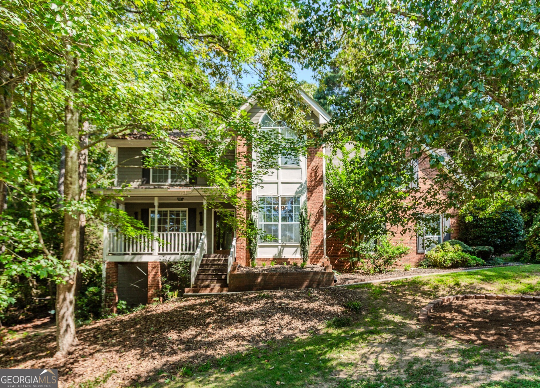 Calling All First-Time Homebuyers & Investors! Welcome to your opportunity to own in Walton County with no rental restrictions and an optional HOA! As you step inside, you're greeted by a formal dining room to the right perfect for gatherings and a spacious family room with a cozy fireplace to the left, ideal for entertaining. The kitchen boasts white cabinets, granite countertops, and a separate breakfast area, offering both style and functionality. Upstairs, you'll find an oversized master suite with a renovated bath featuring double vanities, a separate tub and shower, and a large walk-in closet. Three additional bedrooms and a full bath provide plenty of space for family, guests, or a home office. This home sits on a private 1-acre lot with a wooded backyard, offering peace and seclusion. Enjoy the versatility of a partially finished basement that's ready to entertain or become your personal masterpiece. Perfect as a game room with space for a pool table, home theater, or bar area or transform it into a private gym, studio, or retreat. With plenty of room to customize, this lower level adds endless potential to make the home uniquely yours. While it's priced to reflect the need for new flooring and interior paint, it presents a fantastic chance to customize it to your taste. Conveniently located near retail, restaurants, and Highway 78, this home offers both privacy and accessibility. Don't miss out bring your buyers and make an offer today!