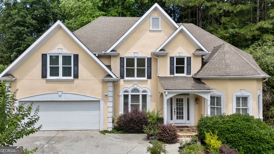 Welcome to one of the best values in Alpharetta. Tucked away on a quiet cul-de-sac and elevated just like the neighboring homes, this property sits proudly above the street with classic stairs leading to the front door-and incredible natural light streaming through every level.    Zoned for the highly sought-after Johns Creek High School, this 5-bedroom, 4-bath home offers the perfect bones for personalization. It's not a fixer-upper, but it does need some love-which is exactly why it's priced so attractively.    The layout is functional and flexible, with a full daylight basement that's already framed and partially finished-ready for your media room, guest suite, or home gym. The elevated, tiered backyard is a sunny and private retreat, perfect for gardening or outdoor entertaining.    This home is priced well below market to reflect cosmetic updates, offering rare upside and immediate equity in a premier neighborhood.    Opportunities like this don't last-schedule your showing today and imagine what's possible.