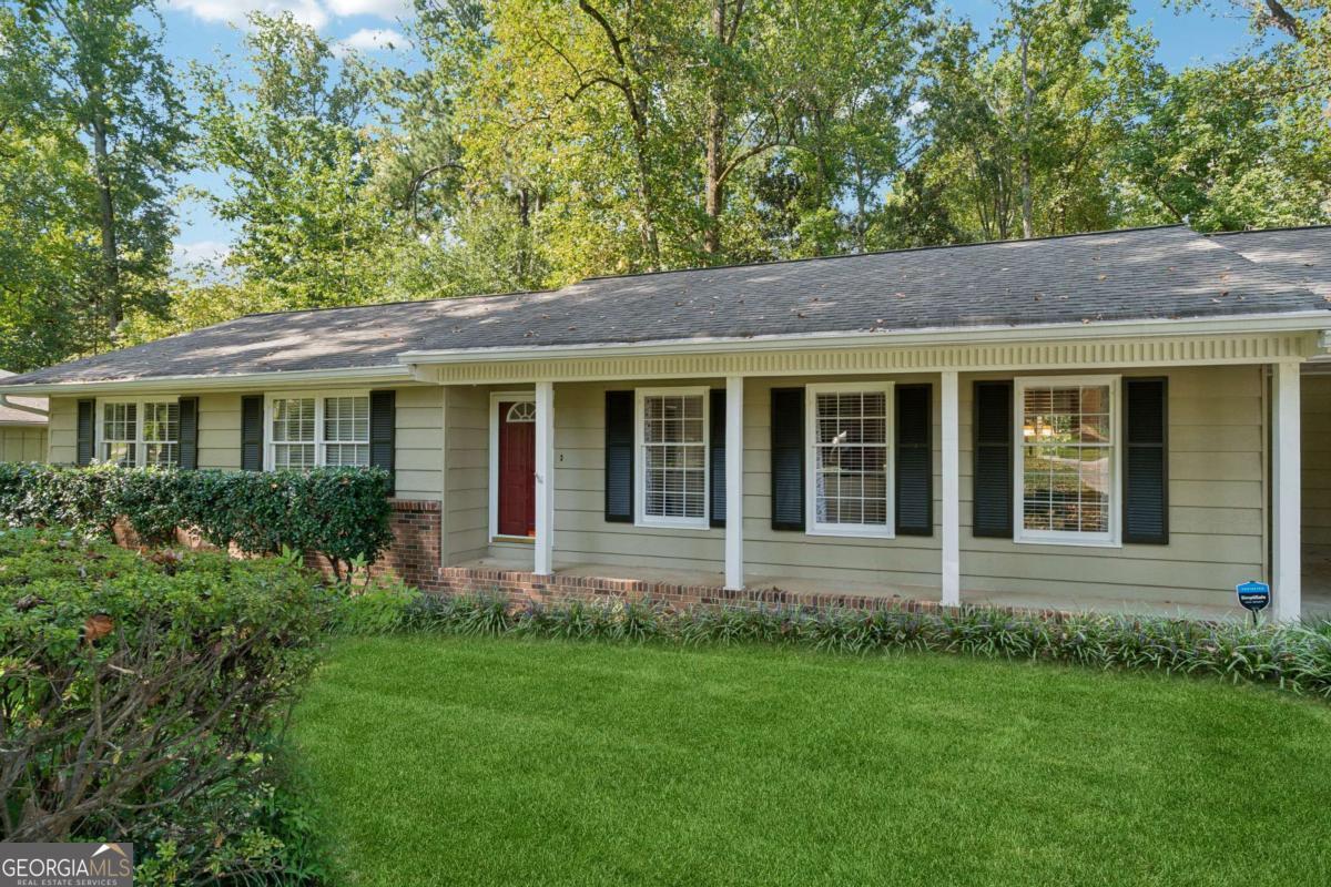 Just on the edge of Tucker, this home has the best of Tucker and Lilburn. Conveniently located minutes from both downtown centers, great restaurants, shopping, entertainment, parks, PLUS you get to take advantage of the lower Gwinnett taxes! This classic, renovated RANCH has 3 Bedrooms and 2 Baths on a finished basement. It's got a Master on the Main! Discover a thoughtfully redesigned floor plan that blends style, function, and comfort where the heart of this home is the modern, open layout! The Family Room is spacious and bright with tons of natural light, and a Dining Area that's perfect for everyday dinners and entertaining. Updates include new hardwood flooring, neutral paint colors, recessed lighting and a white-washed brick fireplace topped with a sleek wood mantel combined to create a warm welcoming living space where everyone wants to hang out. If you like to cook you'll love this updated kitchen! Featuring SS appliances, a modern farm sink with disposal, solid surface countertops, under cabinet lighting, tons of cabinet space, a convenient butcher block counter for prepping your culinary masterpieces, and a sleek new stainless vent hood over the range. This kitchen has it all plus a walk in pantry, cozy breakfast spot and a huge laundry space! (with more storage)! Refrigerator and Washer/Dryer remain with the home! Venture out to a large NEW composite deck that's big enough for grilling out, al fresco dining, star gazing and lots of room to relax on those lounge chairs you've always wanted! This inviting fenced backyard retreat comes complete with a firepit and mature azealeas, ferns and flowers! In classic ranch style, the bedrooms are down the wide hallway with a separate guest bath. The primary suite features 2 closets, and an ensuite bath with a large shower! Just when you think you've seen everything, don't miss the fantastic finished basement! Who doesn't need a craft room, storage closet for clothes, toys & decorations, a workshop, and a fully finished Man Cave/Movie Room/Play Room. There's another huge storage room with built-in shelves for all your decorations and special treasures. ADDITIONAL UPDATES include a NEW AC (2024), Crown Moulding, Gutter Guards, New Door to the Deck with built in blinds, Security Lights, and more! All the heavy lifting has been done - this beauty is ready for you! Don't miss an opportunity to make this home your own!