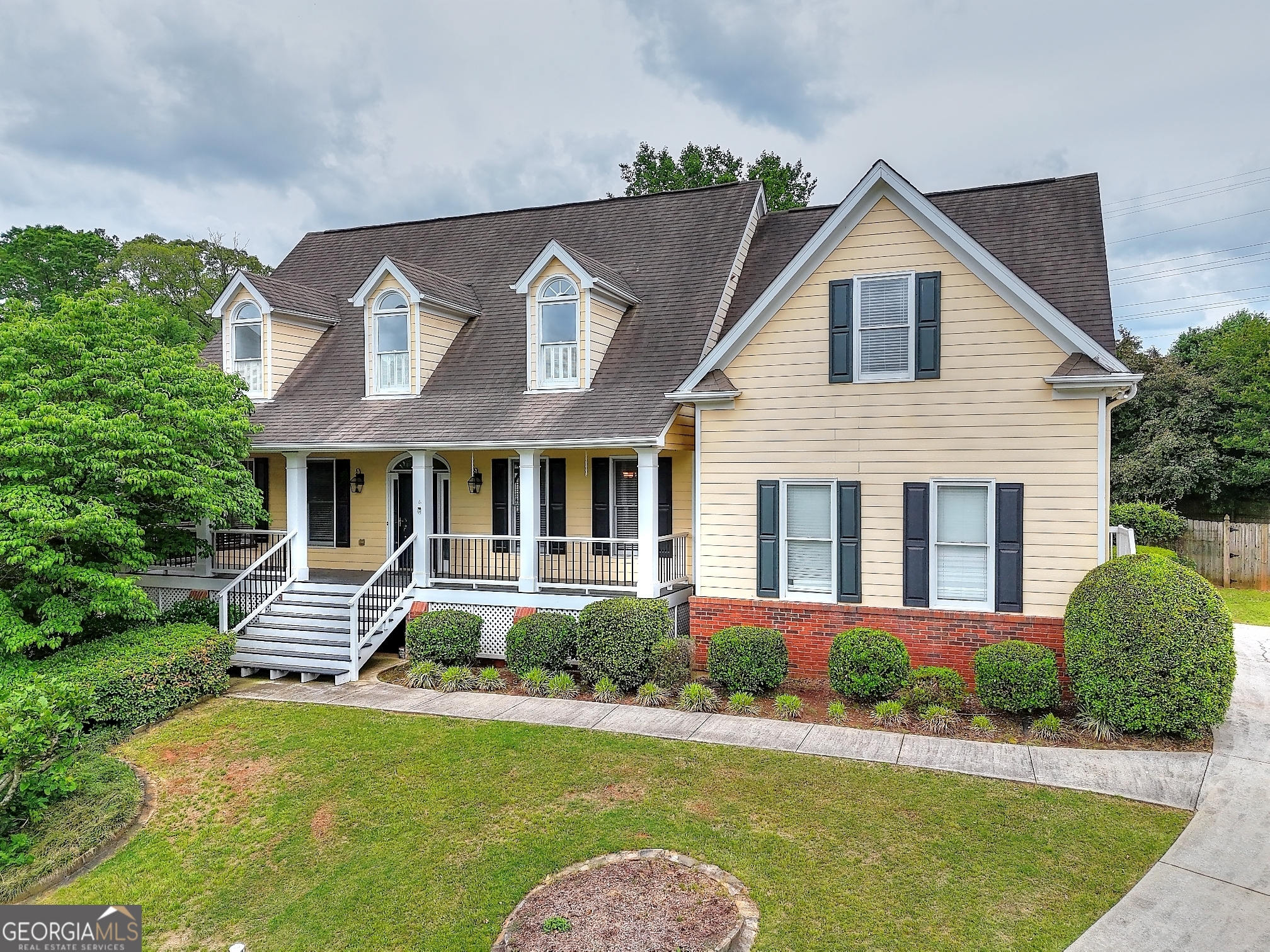Nestled in the sought-after Kings Farm subdivision and located in a top-rated East Cobb school district, this stunning, freshly-painted 6-bedroom, 4.5-bathroom residence offers the perfect blend of comfort, style, and functionality. The property features a generous front porch, providing an inviting outdoor space, ideal for greeting guests or simply relaxing. The main-level master suite is a true retreat, featuring a walk-in closet and a spa-inspired ensuite bath. The open-concept main floor is constantly filled with natural light and is home to a peaceful office space, a dedicated formal dining area, a cozy family room, and a homey eat-in kitchen with classic granite countertops. The upper level includes well-designed Jack and Jill bedroom configurations, with multiple Foversized secondary bedrooms featuring en-suite bathrooms and convenient walk-in closets . The thoughtfully finished basement presents versatile space suitable for a media room, home fitness center, or in-law suite. Externally, the property benefits from a level backyard situated within a tranquil cul-de-sac, perfect for play, entertaining, or unwinding. Residents of Kings Farm enjoy fantastic community amenities, including swim and tennis facilities, and an active HOA that keeps the neighborhood vibrant. Don't miss this one-of-a-kind opportunity to own a beautiful home in one of East Cobb's most desirable communities!