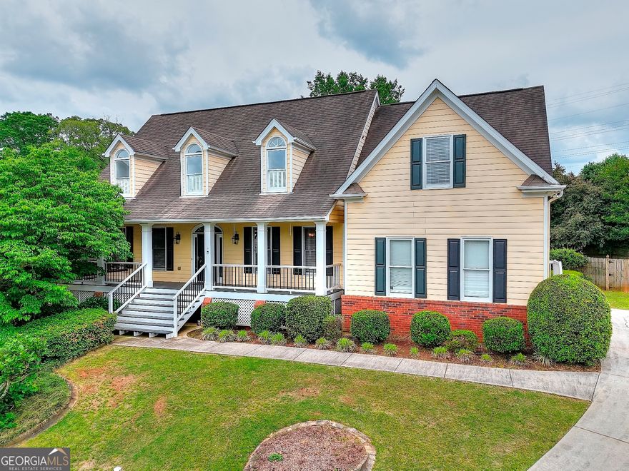 Nestled in the sought-after Kings Farm subdivision and located in a top-rated East Cobb school district, this stunning, freshly-painted 6-bedroom, 4.5-bathroom residence offers the perfect blend of comfort, style, and functionality. The property features a generous front porch, providing an inviting outdoor space, ideal for greeting guests or simply relaxing. The main-level master suite is a true retreat, featuring a walk-in closet and a spa-inspired ensuite bath. The open-concept main floor is constantly filled with natural light and is home to a peaceful office space, a dedicated formal dining area, a cozy family room, and a homey eat-in kitchen with classic granite countertops. The upper level includes well-designed Jack and Jill bedroom configurations, with multiple Foversized secondary bedrooms featuring en-suite bathrooms and convenient walk-in closets . The thoughtfully finished basement presents versatile space suitable for a media room, home fitness center, or in-law suite. Externally, the property benefits from a level backyard situated within a tranquil cul-de-sac, perfect for play, entertaining, or unwinding. Residents of Kings Farm enjoy fantastic community amenities, including swim and tennis facilities, and an active HOA that keeps the neighborhood vibrant. Don't miss this one-of-a-kind opportunity to own a beautiful home in one of East Cobb's most desirable communities!