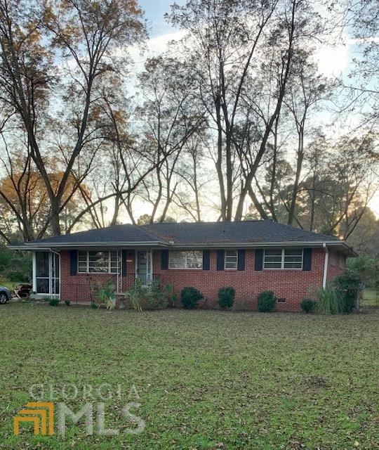 Charming 3-bedroom brick home just a hop, skip & a jump away from Historic Downtown Covington, GA. Updated appliances -- Fridge stays. Fenced-in backyard. Screened-in porch. New roof. Eastside schools. Property currently rented. No seller's property disclosure.