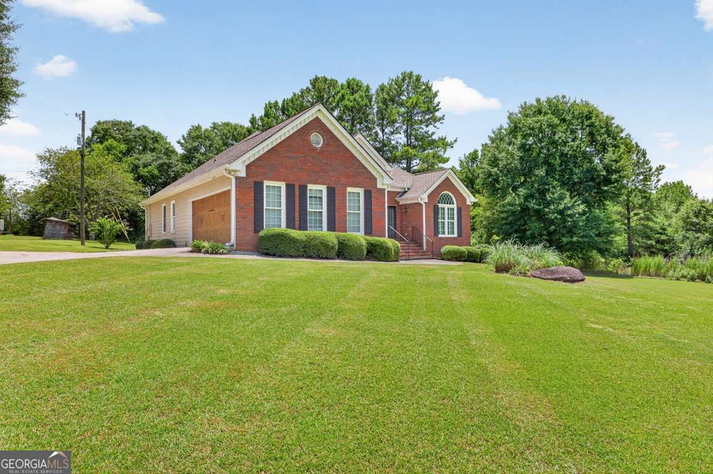 Photo of 1262 Bowman Road, Lawrenceville, GA 30045 (MLS # 10808646)