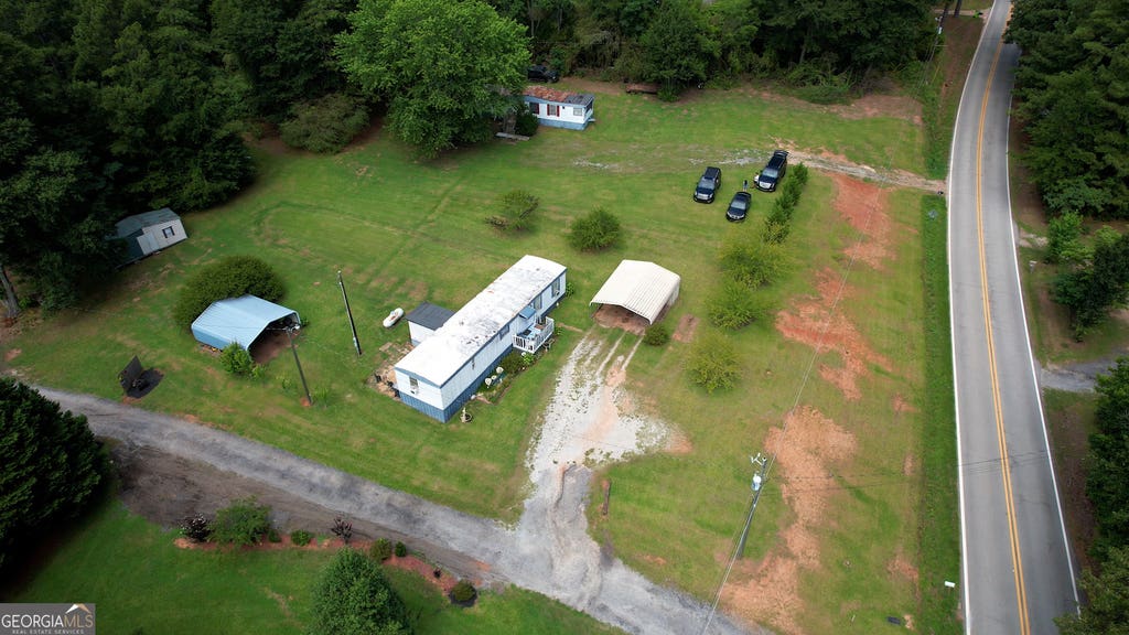 Photo of 697 Rocky Plains Road, Covington, GA 30016 (MLS # 10809429)