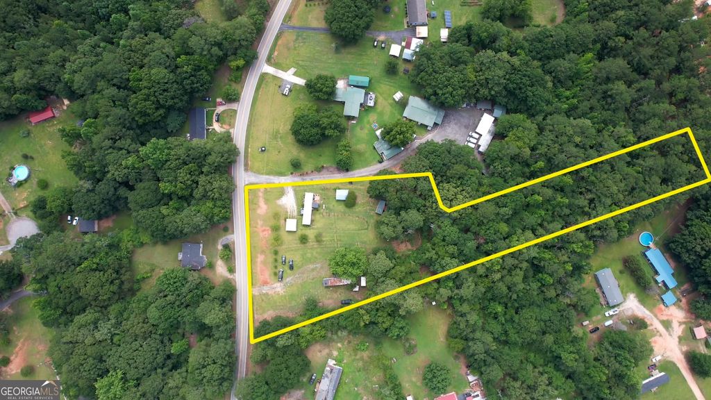 Photo of 697 Rocky Plains Road, Covington, GA 30016 (MLS # 10809429)