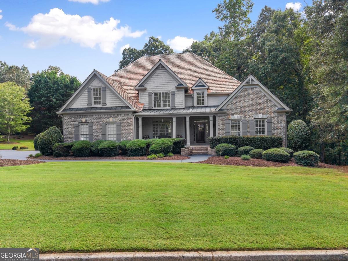 Stunning 7-Bedroom Estate with In-Law Suite in Dawsonville Welcome to 184 Scarlet Oak Lane, a breathtaking 6,455 sq. ft. residence offering exceptional space, luxury, and functionality. Nestled in a desirable Dawsonville neighborhood, this 7-bedroom, 4.5-bath home is designed to accommodate multi-generational living, entertaining, and everyday comfort. The main level boasts an oversized owner's suite featuring a completely renovated spa-like bath and a custom his and hers walk-in closet. An oversized formal dining room which easily accommodates 10-12, chef's kitchen with high end gas appliances, custom pantry shelving, and spacious living areas make the heart of the home perfect for gatherings. Upstairs, you'll find three generously sized bedrooms, a large Jack-and-Jill bathroom with an additional flex room, another full bath and updated HVAC (2 years old). The fully finished basement is brand new throughout, complete with all new wiring, appliances, HVAC, and flooring. It features a full in-law apartment with its own full kitchen, laundry, and stair lift for accessibility, along with a beautifully finished man cave and exercise room. Additional highlights include: * Circular driveway (one of the few in the community) * Full home alarm system * Irrigation system * Cedar shake roof with 10-year warranty This home blends elegance with practicality, offering ample living space, modern updates, and thoughtful details throughout. Whether you're hosting, working from home, or enjoying time with family, 184 Scarlet Oak Lane is truly one-of-a-kind.