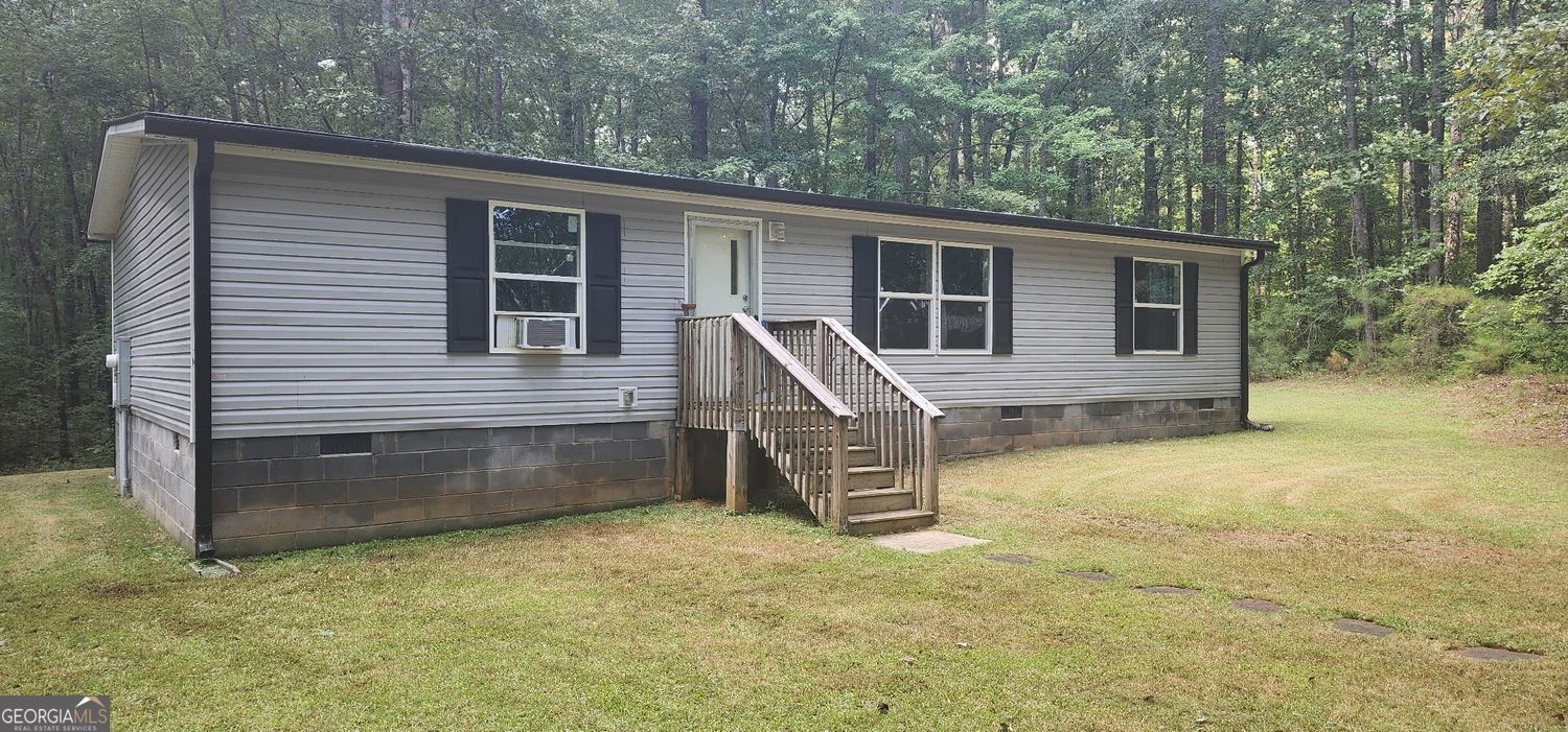 2016 Modular Home on 7.6 Acres ? Heard County Getaway!Enjoy peaceful country living in this 3BR/2BA home on a private 7.6-acre lot. Featuring an open floor plan, modern kitchen, central air/heat, and low taxes, it?s the perfect retreat with room to garden, play, or just relax in nature?convenient to Franklin and Newnan.