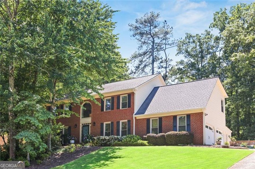 Discover your dream home in the heart of East Cobb. This stunning 4-bedroom, 2.5-bathroom home is nestled in the desirable swim/tennis neighborhood of Beacon Hill offering not just a home, but a lifestyle. Step inside to discover a spacious and welcoming layout, where a large sunroom invites natural light, creating a seamless connection between the living room and the expansive kitchen. Perfect for entertaining, the kitchen can cater to a large party or an intimate family gathering.  Everyone will appreciate the flexibility in room options-  ideal for a playroom, media center, or home office, and the abundant storage located throughout the house making organization effortless. As you explore further, you will find a recently renovated primary bathroom with a gorgeous soaking tub and perfectly updated secondary bathroom. The primary suite has a quiet sitting area and secondary rooms are oversized. The beautifully landscaped and fully fenced backyard becomes your private oasis, a serene retreat for relaxation around the firepit or fun gatherings in the open playable space.  This home is not just about luxurious comfort but also about the convenient location. Situated near highly rated schools, like Lassiter High School, it's perfect for those who are prioritizing education. East Cobb offers organized sports for both kids and adults and an amazing Parks and Recreation Community catering to those who love an active lifestyle. Enjoy proximity to an aquatic center, gyms, and grocery offerings like Trader Joe's and Whole Foods. For those who enjoy the social scene, you're just a stone's throw away from amazing restaurants, shopping and cultural attractions of downtown Roswell and Marietta Square. Welcome Home!