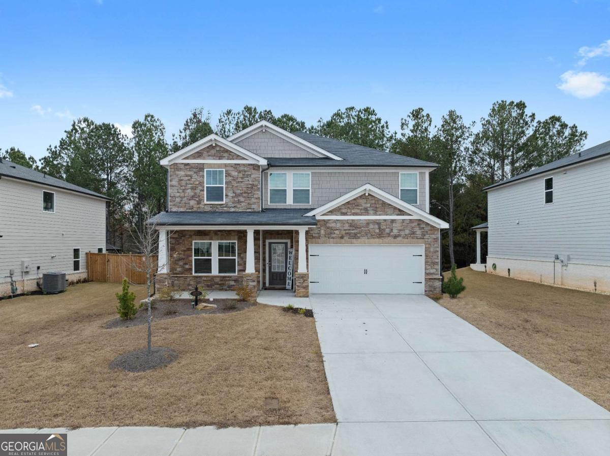 Stunning 5-Bedroom Home in Desirable Loganville Community** This newly built 2023 home, with only one previous owner, offers a highly sought-after neighborhood in Loganville, Walton County. Located in a quaint and walkable community, the property is perfect for families looking for spacious living in a peaceful yet vibrant environment. The home features an open floorplan with 5 generously sized bedrooms, offering ample space for family members or guests. The swim/play community provides an excellent setting for recreation, with a pool and playground just steps away. Set in a neighborhood with great schools and easy access to local shops, dining, and major highways, this home is ideal for those seeking both comfort and convenience. The property is in a desired Loganville location where availability is rare, making this an opportunity you won't want to miss. A community designed for active living. Don't wait - schedule a tour today and make this beautiful, modern home yours!