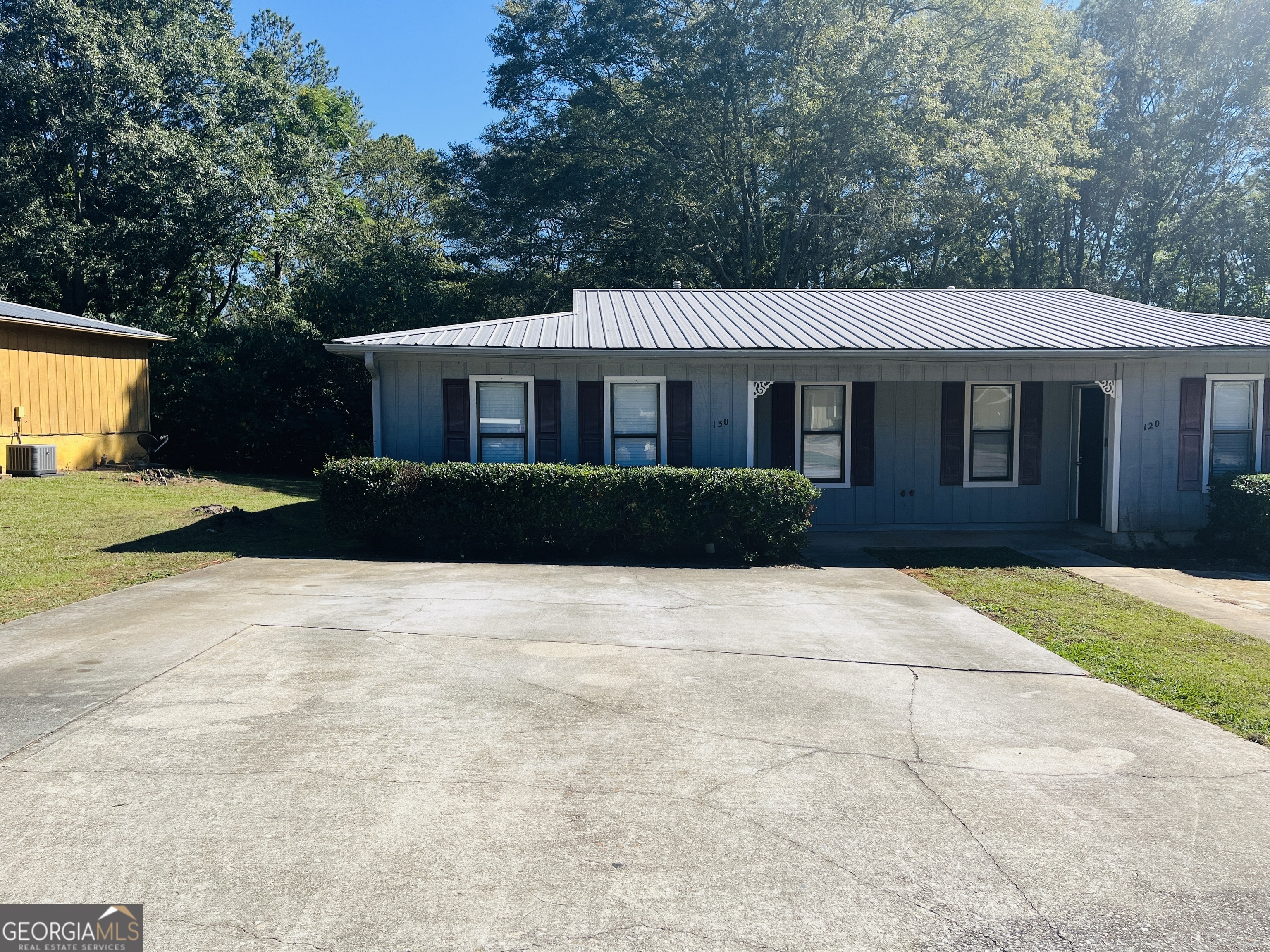 Wow! Newly renovated, well cared for 2 bed and 1 full bath, large wooded lot, freshly painted interior, covered rear patio, LVP flooring, 2 car parking pad, master on the main, large kitchen, W/D hookups, excellent location with quick access to I-85, must see!