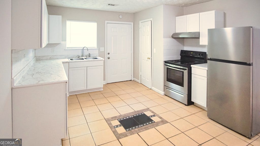 Photo of 6112 Green Acres Drive SW, Covington, GA 30014 (MLS # 10808154)