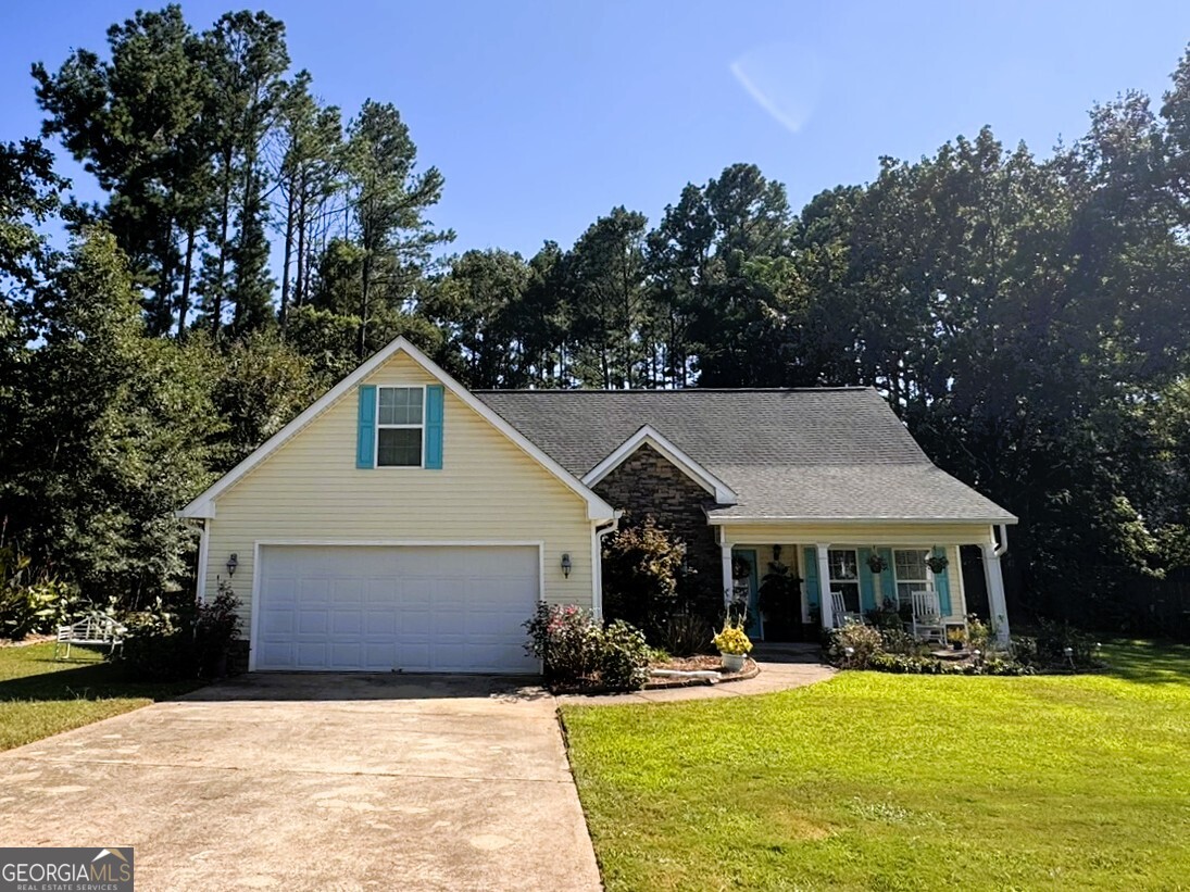Welcome to this well-maintained ranch home featuring an open and spacious floor plan designed for both comfort and functionality. The home offers a split-bedroom layout for added privacy, along with a separate dining room and a bright eat-in kitchen, perfect for everyday living and entertaining. The finished bonus room above the garage can also be used as a 4th bedroom. Situated on a large, level lot, this property also includes a storage building and a two-car garage for added convenience. Located within walking distance to downtown Social Circle and local schools, this home combines small-town charm with modern convenience. Plus, it's just a short drive to Covington and Monroe, where you'll find additional shopping, dining, and entertainment options. Don't miss the opportunity to make this spacious ranch your next home!