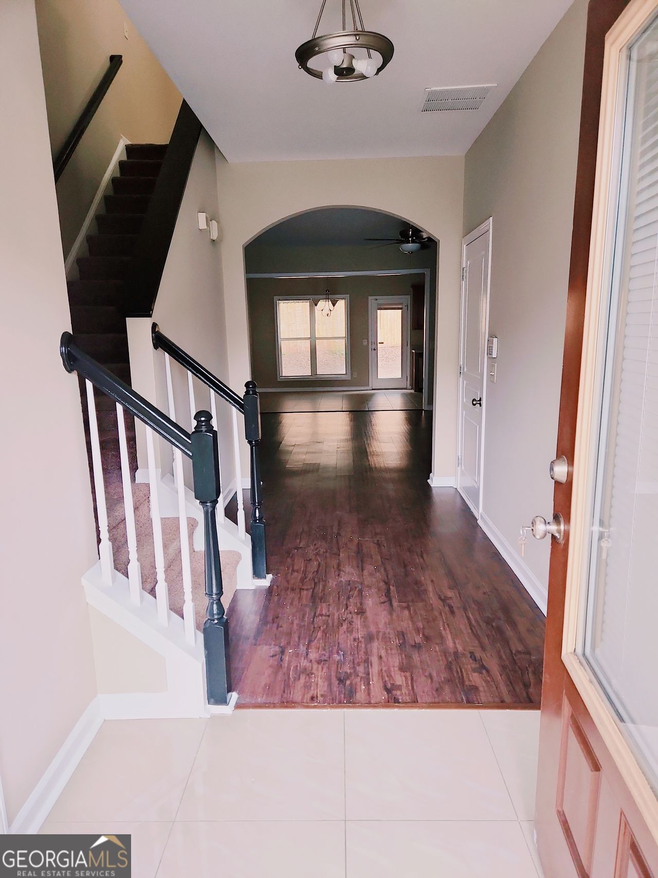 Newly painted 3-bedroom, 2.5-bath townhouse located in a prime location. Spacious Close to shopping, restaurants and easy access to Hwy 85. This home has a nice open floorplan with beautiful wide planked hardwoods on the first floor and a generous fireside Great Room. Kitchen is beautifully equipped with stainless steel appliances, walk-in pantry and a large eating area, that transitions to the rear outside deck. 3 spacious bedrooms upstairs and 2 large bathrooms, with nice landing area. Private backyard with grill area perfect for entertaining. NO RENTAL RESTRICTIONS
