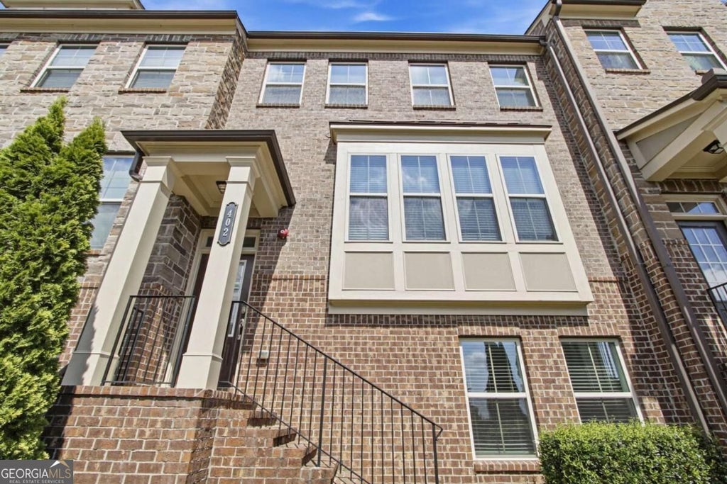 Photo of 402 Montclair Court, Woodstock, GA 30188 (MLS # 10854716)