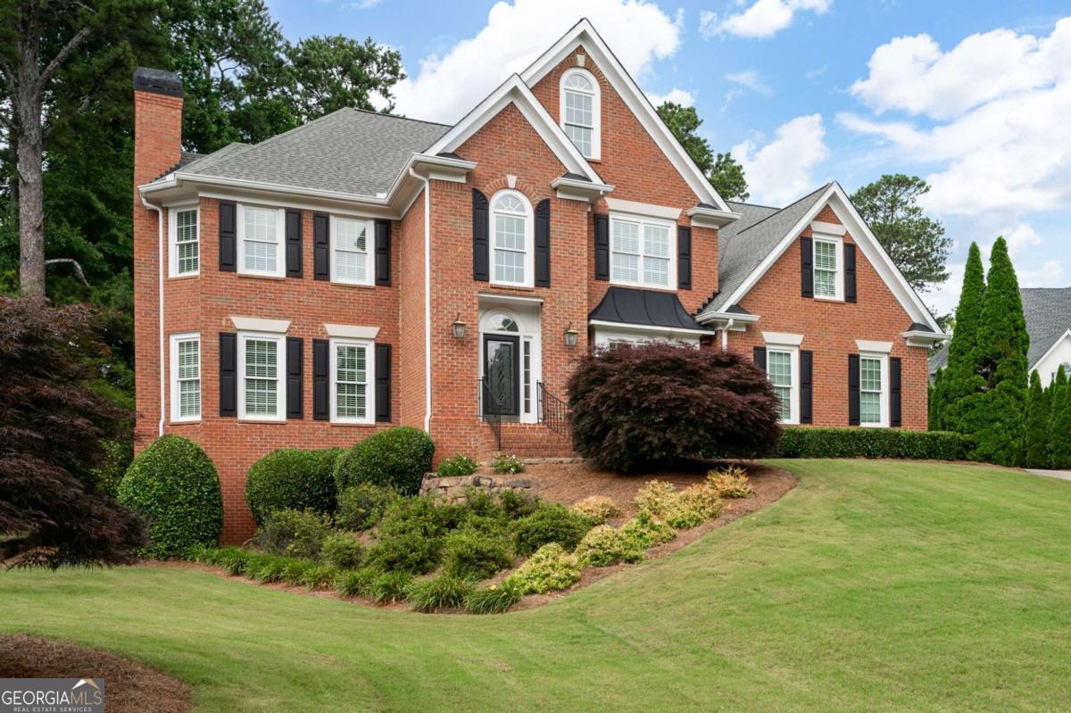 Stately Home on a Cul-de-Sac with Private Backyard Oasis - Steps to Sope Creek Elementary Welcome to your dream home in the heart of East Cobb! Nestled on a quiet cul-de-sac, this expansive and beautifully maintained residence offers stunning curb appeal with professionally manicured landscaping and a charming treehouse in the flat, fully fenced backyard. From the moment you step inside the grand two-story entrance, you'll appreciate the craftsmanship and thoughtful design throughout - from elegant curved archways and rich trim work to the warmth and flow of each living space. To your right, a stately home office with built-ins (or optional main-level guest suite) provides a sophisticated work-from-home environment. To the left, a cozy living room adds to the welcoming atmosphere. The updated kitchen features sleek quartz countertops, stainless steel appliances, a walk in Pantry, and a functional open layout that connects seamlessly to the vaulted family room. Watch your kids play in the private backyard through large picture windows while preparing dinner, or enjoy the view from your low-maintenance Trex deck and screened-in porch - perfect for relaxing or entertaining year-round. Upstairs, you'll find four oversized bedrooms, each with generous walk-in closets and plantation shutters throughout. The spacious primary suite offers a peaceful retreat with space for a sitting area and a custom closet ready to keep you organized. The finished basement includes a recreation room, home theater room, a craft room, tons of storage and a private bedroom suite with full bath - ideal for guests, teens, or multigenerational living. Best of all, walk to Sope Creek Elementary School, one of the area's most beloved and top-rated schools.