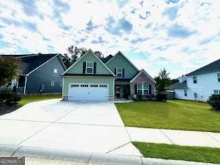 Beautiful Lake View with expandable space for a growing family! Two bedrooms and two baths on the main floor, and 3 bedrooms upstairs. Offering a great location with a neighborhood swimming pool, sidewalks, and near shopping, schools, and medical facilities