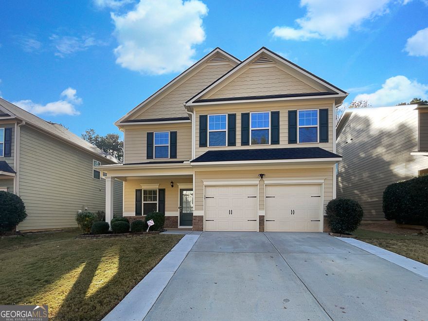 Seller may consider buyer concessions if made in an offer. Welcome to this beautifully updated home. The neutral color paint scheme and fresh interior paint create a calming atmosphere. The living room features a cozy fireplace, perfect for chilly evenings. The kitchen is a chef's dream with a center island, accent backsplash, all stainless steel appliances. The primary bedroom boasts a walk-in closet and an en-suite bathroom with double sinks, a separate tub, and shower. Partial flooring replacement and new appliances add a modern touch. Outside, enjoy a patio and a fenced-in backyard for privacy. This home is a must-see!. Included 100-Day Home Warranty with buyer activation