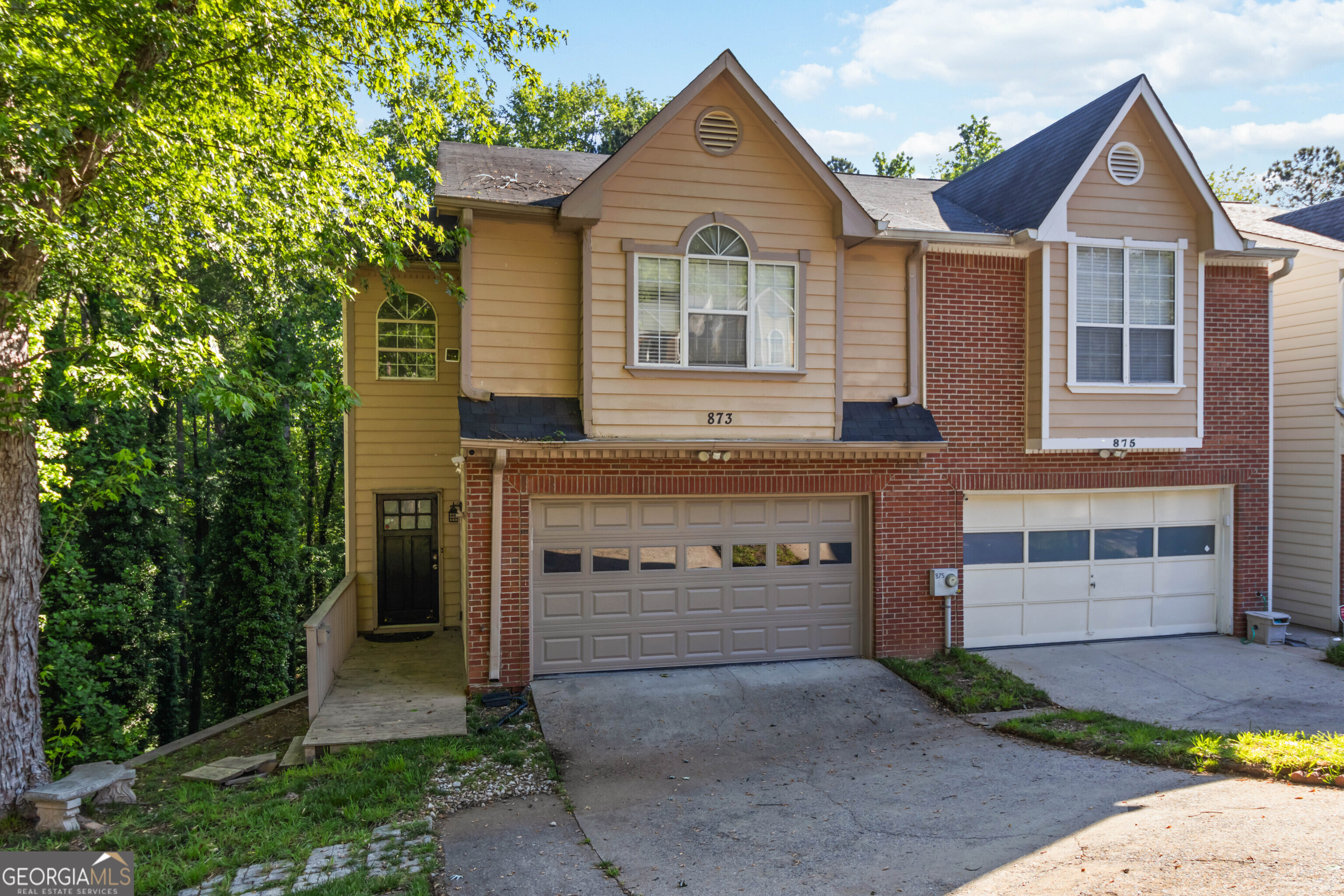 Seller financing available! Lake Views for a Steal. Come See this End-Unit Townhouse Today! You'll Love the Peaceful Neighborhood, Especially in this Cul de Sac Location comes with a 3 Levels space! Plenty of Room for All Your Needs. Gorgeous Granite and Trendy Paint Colors. Enjoy Cooking Out on the Back Deck Overlooking the Community Lake. Use the Basement for as an Extra Suite for Guests, In-Laws or Teens. There is a backyard with a rear porch and a 2 car garage