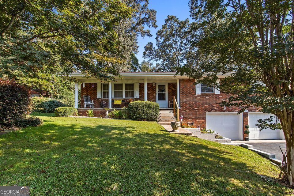 Welcome to this timeless brick home nestled in an established subdivision in the heart of Fort Oglethorpe, Georgia. Built in 1966, this 3-bedroom, 2-bath residence offers both character and comfort with a spacious layout. Step inside to find a large, inviting kitchen with plenty of counter space and storage-perfect for family meals or entertaining guests. The finished basement provides additional living space, ideal for a den, home office, or recreation room, giving you the flexibility to fit your lifestyle. Outside, the mature neighborhood setting offers a sense of community and charm, with convenient access to shopping, dining, parks, and schools. This home combines classic construction with modern conveniences, making it a fantastic opportunity for those seeking comfort in a well-established area. Don't miss your chance to own this beautiful brick home in Fort Oglethorpe-schedule your private tour today!