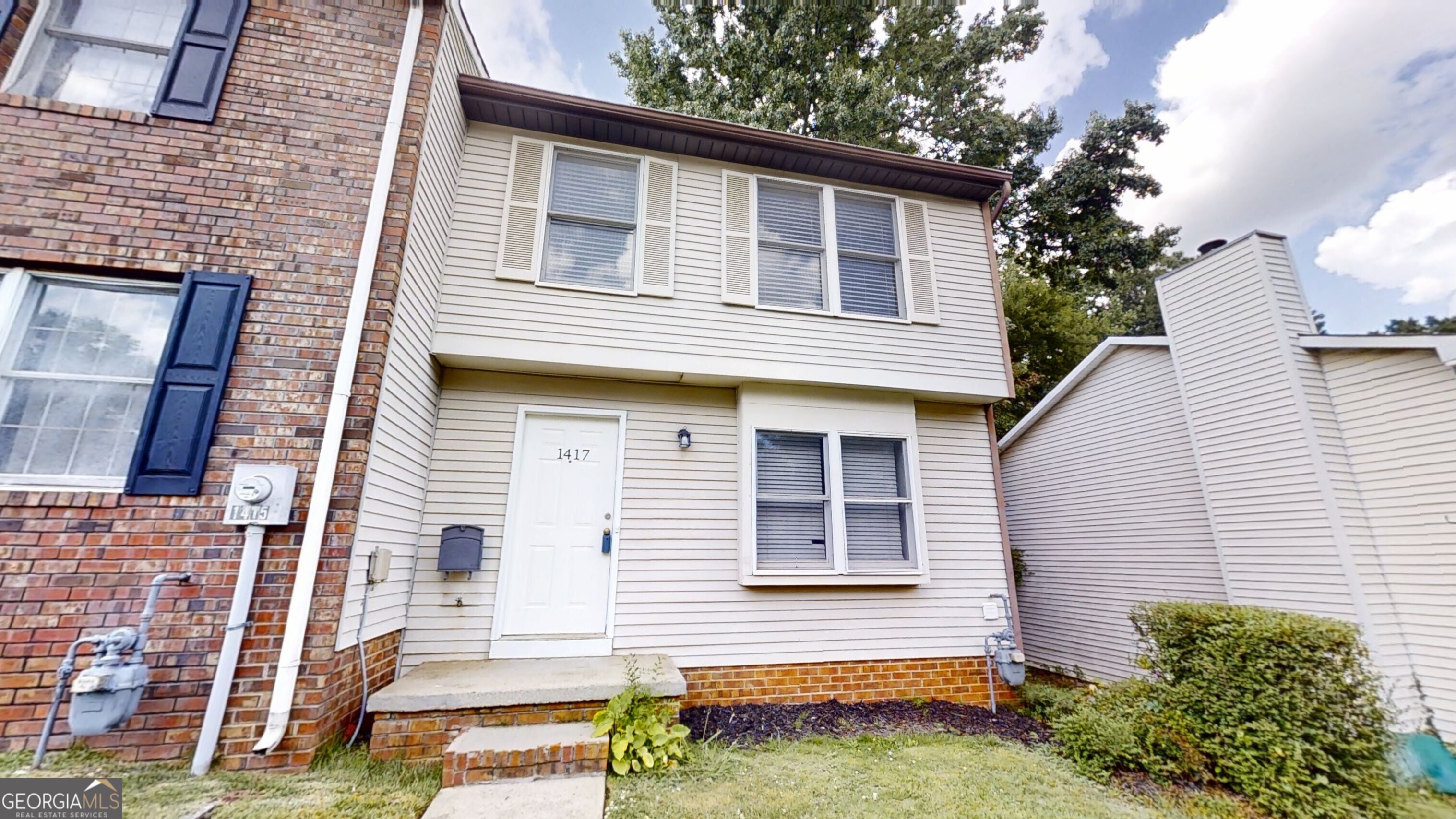 Welcome to this beautifully updated 3-bedroom, 2.5-bath townhouse located in the desirable Windy Hill Forest community. Featuring LVP flooring on the main level, fresh carpet upstairs, and new paint throughout, this home offers a clean, modern feel from top to bottom. The kitchen is both functional and inviting with white cabinets, stone countertops, and stainless steel appliances. A smart split-bedroom layout provides comfort and privacy, making this home ideal for families, roommates, or guests. Step outside to a private, fenced-in backyard with a rear deck perfect for entertaining or simply relaxing. Located in the ever-growing Smyrna area, you'll enjoy quick access to I-75 and I-285, making commuting a breeze. Surrounded by parks, shopping, dining, and entertainment, this home offers the perfect blend of convenience and lifestyle. Don't miss your chance to own this move-in-ready gem schedule your showing today!