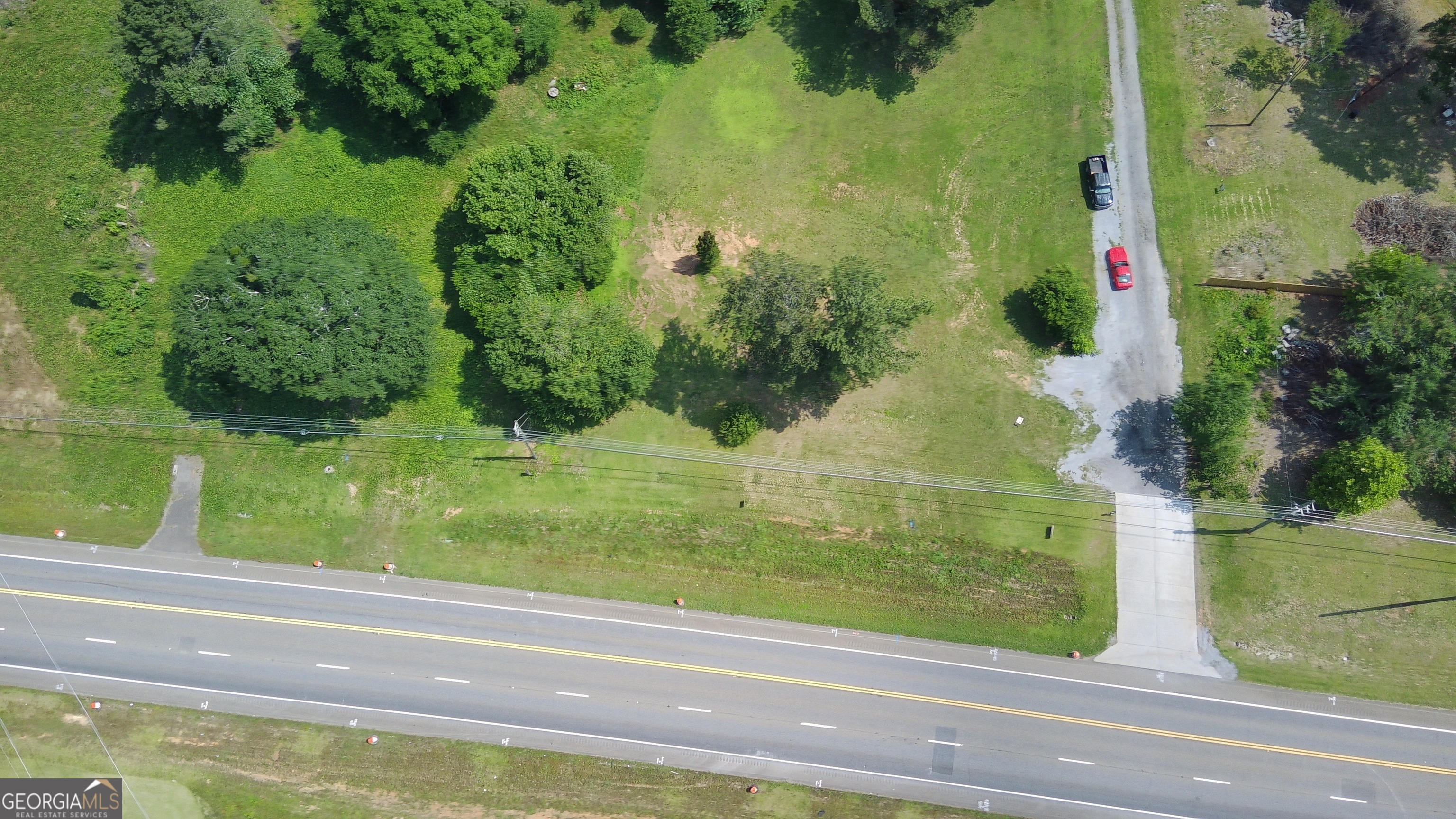 Great location in Canton with 8.11 +/- acres to build your dream home, estate or farm. Seller will consider owner financing with terms flexible. New survey in hand.