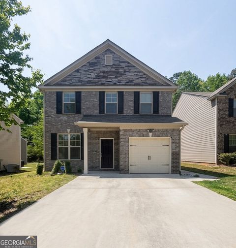 Photo of 5721 Grande River Road, Atlanta, GA 30349 (MLS # 10731115)