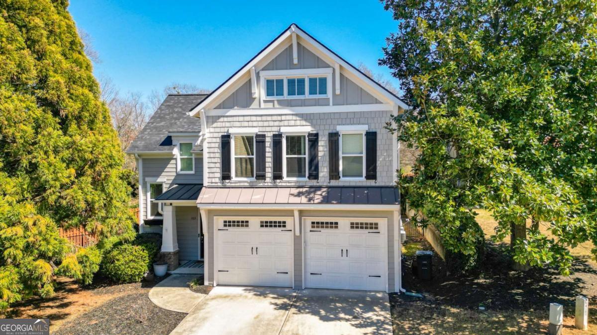 Located just off Whitlock Avenue in the heart of Marietta, this stunning home offers the perfect combination of modern comfort and timeless elegance. Nestled in an exclusive 17-home community, this beautifully designed residence features an open-concept layout and a grand two-story entryway, creating an inviting and sophisticated atmosphere. The spacious kitchen is a chefCOs dream, boasting quartz countertops, ample cabinetry, a cozy eat-in area, and a bar for additional seating. Overlooking the bright and airy living room with a warm fireplace, this space is ideal for both everyday living and entertaining. A separate dining room adds a formal touch, while the kitchen-level entry garage provides added convenience. Upstairs, the expansive ownerCOs suite offers a true retreat with double vanities topped with quartz countertops, a walk-in shower, a separate soaking tub, and a large walk-in closet. Three additional bedrooms and two full bathrooms provide plenty of space for family, guests, or a home office, while ample closet space ensures easy storage throughout the home. Step outside to the brand-new oversized patio, perfect for outdoor relaxation, dining, or hosting gatherings in the privacy of your backyard. With a prime location, access to top-rated schools, and close proximity to shopping, dining, and entertainment, this home truly has it all. DonCOt miss this incredible opportunityCoschedule your showing today!