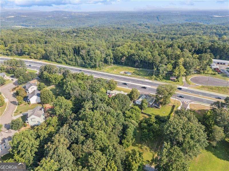 Photo of 4072 Cumming Highway, Canton, GA 30115 (MLS # 10801938)
