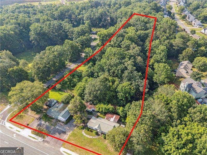 Photo of 4072 Cumming Highway, Canton, GA 30115 (MLS # 10801938)