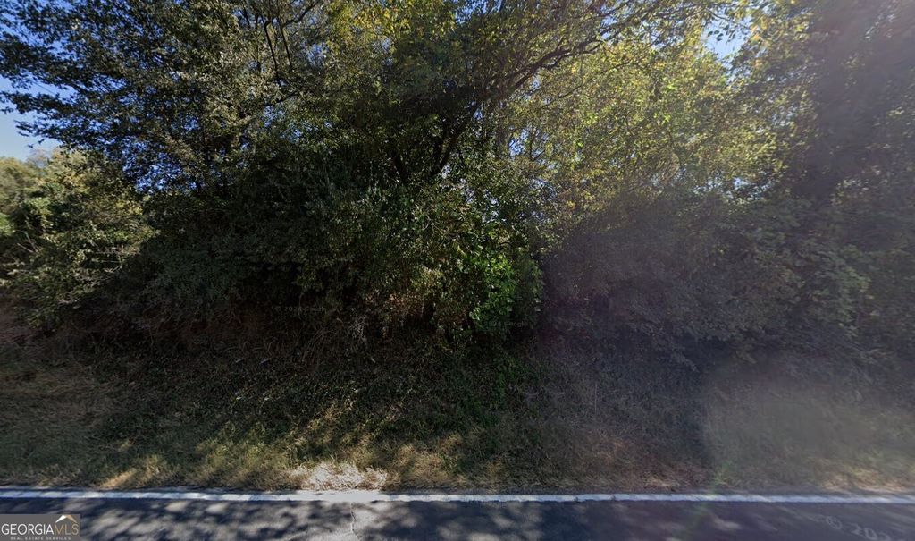 Photo of 9405 Highway 53 E, Marble Hill, GA 30148 (MLS # 10730874)