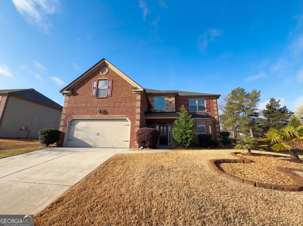 Photo of 411 Little Carter Cove, Loganville, GA 30052 (MLS # 10709030)
