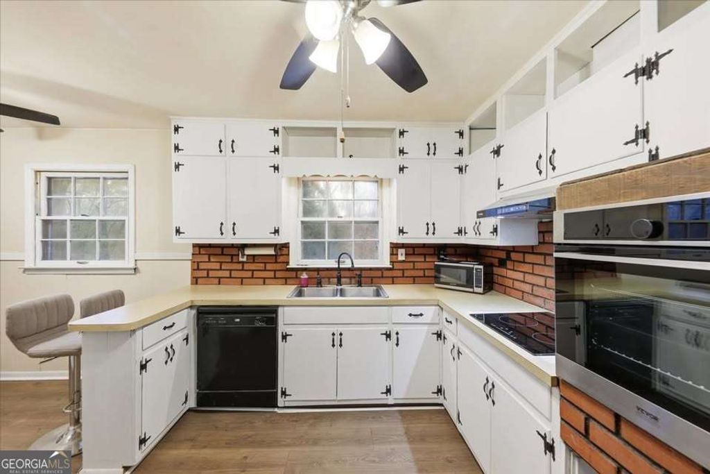 Photo of 8435 Campbellton Fai Road, Fairburn, GA 30213 (MLS # 10659035)