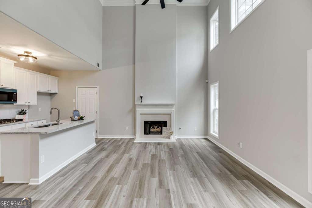 Photo of 3941 Lake Pass Lane, Suwanee, GA 30024 (MLS # 10803950)