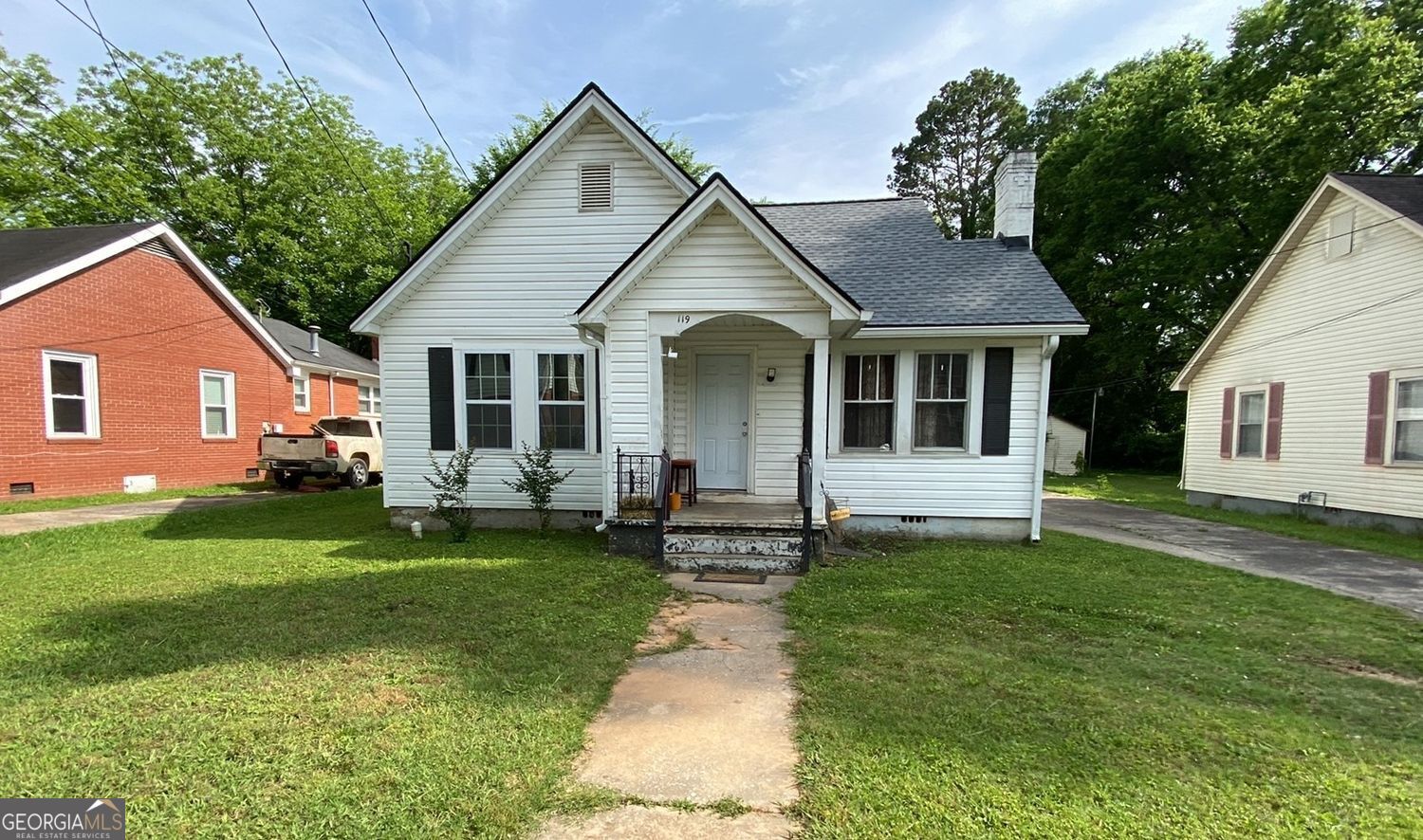 Rare Opportunity in Prime Rockmart Location! This unique property features two separate homes on one lot. The main house offers 3 spacious bedrooms, 2 full bathrooms, a brand new roof, and a new AC system-providing worry-free living and great value. The guest house is a 1-bedroom, 1-bathroom home perfect for extended family, rental income, or a private office/studio space. Which is, conveniently located near the heart of Rockmart, this property blends comfort, flexibility, and investment potential. Don't miss your chance to own this versatile gem!