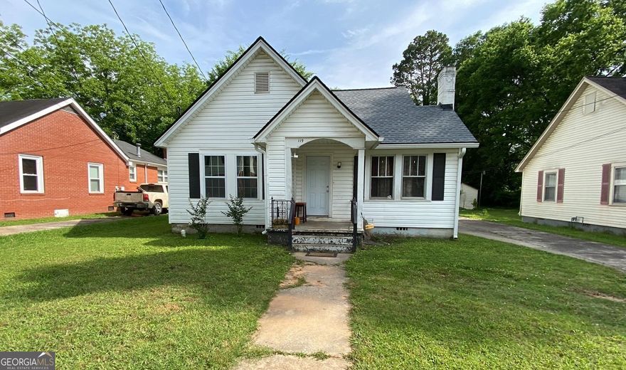 Rare Opportunity in Prime Rockmart Location! This unique property features two separate homes on one lot. The main house offers 3 spacious bedrooms, 2 full bathrooms, a brand new roof, and a new AC system-providing worry-free living and great value. The guest house is a 1-bedroom, 1-bathroom home perfect for extended family, rental income, or a private office/studio space. Which is, conveniently located near the heart of Rockmart, this property blends comfort, flexibility, and investment potential. Don't miss your chance to own this versatile gem!