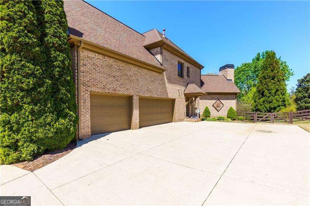 Photo of 5940 Boulder Bluff Drive, Cumming, GA 30040 (MLS # 10727716)