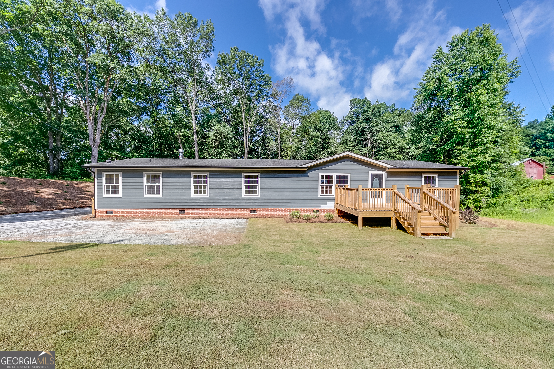Beautifully Renovated 3BR/2BA Modular Home on 2 Acres in Royston, GA! Don't miss this fully updated and move-in ready home offering over 2,000 sq ft of living space on a private, level 2-acre lot. This spacious modular home features a desirable open floor plan with brand new HVAC, granite countertops, and all new stainless steel appliances. The large kitchen flows seamlessly into the dining and living areas, perfect for entertaining. The oversized master suite includes a walk-in closet and a beautifully renovated en-suite bathroom. Additional bedrooms are generously sized with ample closet space. Fresh paint, updated flooring, and stylish fixtures throughout add to the modern appeal. Enjoy quiet country living just minutes from downtown Royston, shopping, and schools. Schedule your showing today-this one won't last long!